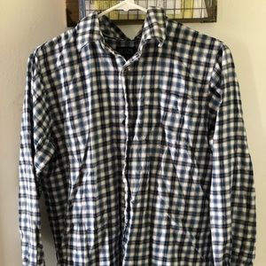 A men’s blue and white button down